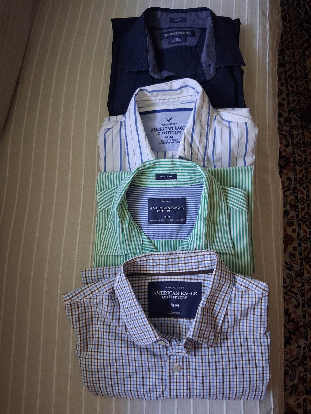 American Eagle Men’s 4 Button-Up Shirts 20 USD Each.
